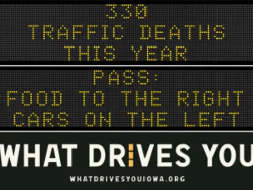 Traffic roadside graphic with text of the news article title.