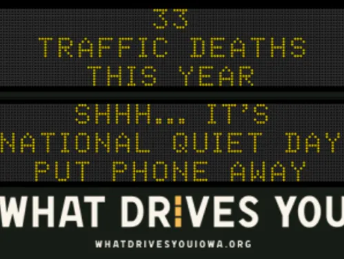 Traffic roadside graphic with text of the news article title.