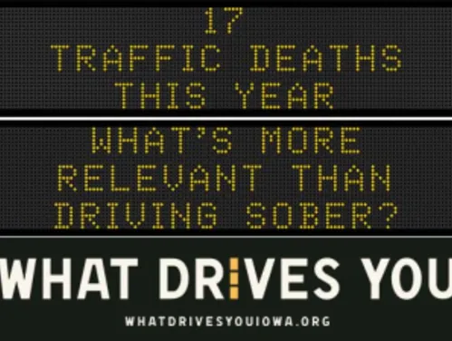 Traffic roadside graphic with text of the news article title.