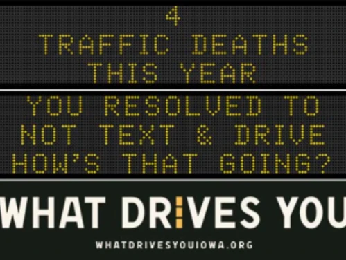 Traffic roadside graphic with text of the news article title.