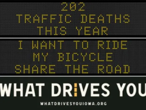 Traffic roadside graphic with text of the news article title.
