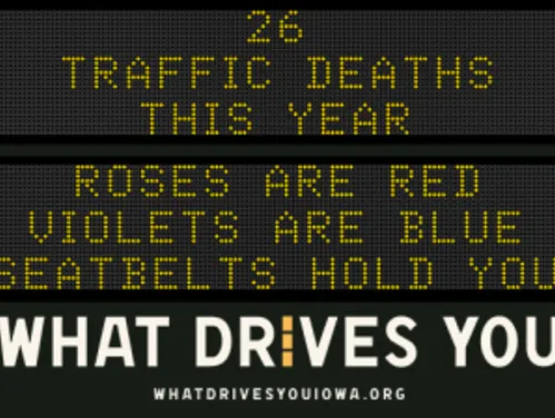 Traffic roadside graphic with text of the news article title.