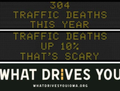 Traffic roadside graphic with text of the news article title.