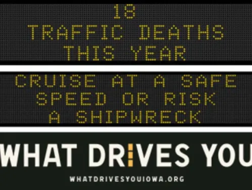 Traffic roadside graphic with text of the news article title.