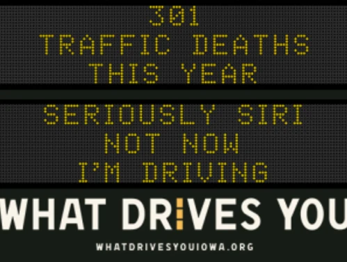 Traffic roadside graphic with text of the news article title.