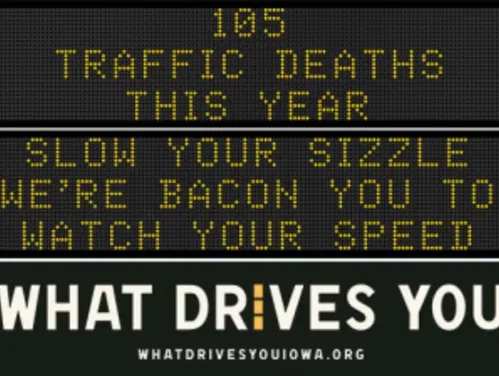 Traffic roadside graphic with text of the news article title.