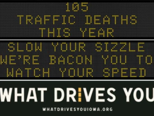 Traffic roadside graphic with text of the news article title.