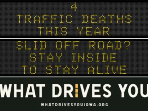 Traffic roadside graphic with text of the news article title.