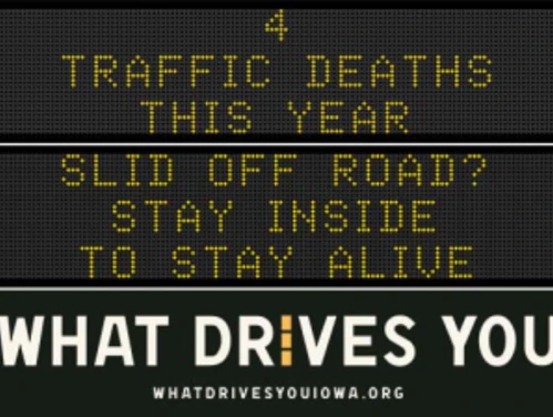 Traffic roadside graphic with text of the news article title.