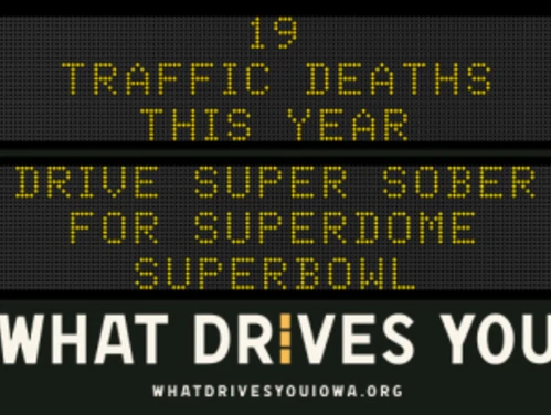 Traffic roadside graphic with text of the news article title.