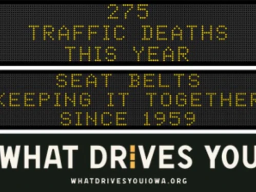 Traffic roadside graphic with text of the news article title.