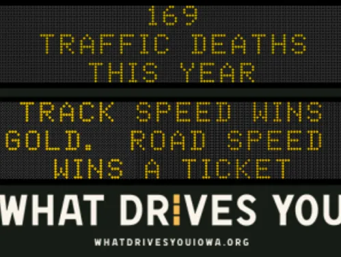 Traffic roadside graphic with text of the news article title.