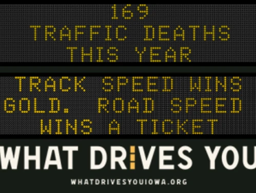 Traffic roadside graphic with text of the news article title.
