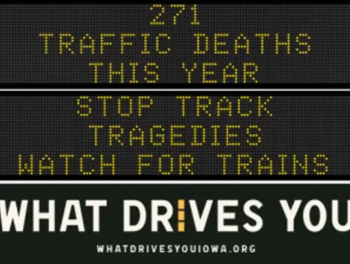 Traffic roadside graphic with text of the news article title.