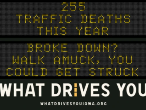 Traffic roadside graphic with text of the news article title.