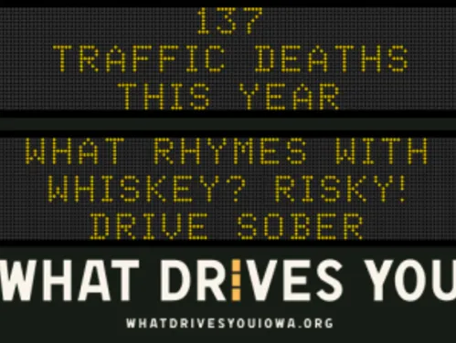 Traffic roadside graphic with text of the news article title.