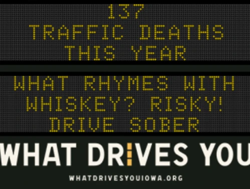 Traffic roadside graphic with text of the news article title.