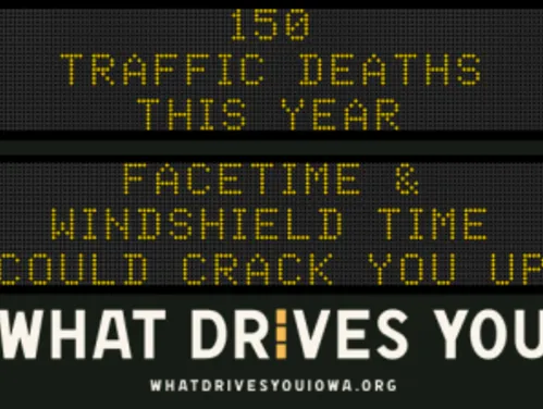 Traffic roadside graphic with text of the news article title.