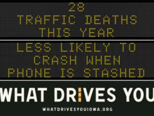 Traffic roadside graphic with text of the news article title.