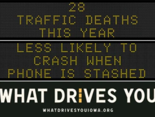 Traffic roadside graphic with text of the news article title.