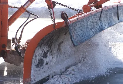 Close up of plow moving snow