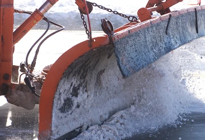 Close up of plow moving snow