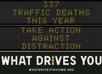 Traffic roadside graphic with text of the news article title.