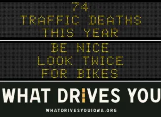 Traffic roadside graphic with text of the news article title.