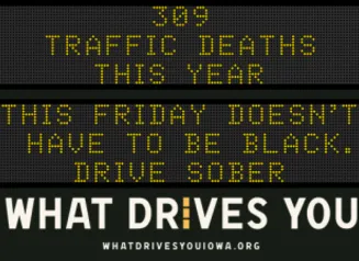 Traffic roadside graphic with text of the news article title.