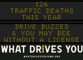 Traffic roadside graphic with text of the news article title.