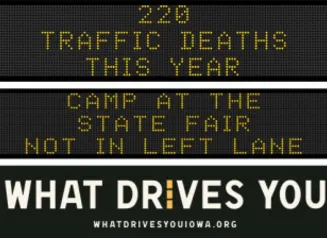 Traffic roadside graphic with text of the news article title.