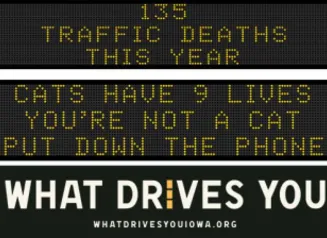 Traffic roadside graphic with text of the news article title.