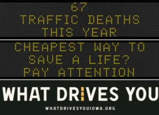 Traffic roadside graphic with text of the news article title.