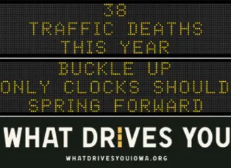 Traffic roadside graphic with text of the news article title.