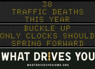 Traffic roadside graphic with text of the news article title.
