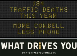 Traffic roadside graphic with text of the news article title.