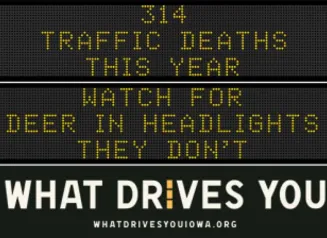 Traffic roadside graphic with text of the news article title.