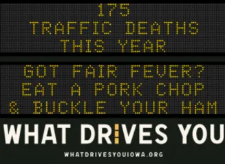 Traffic roadside graphic with text of the news article title.