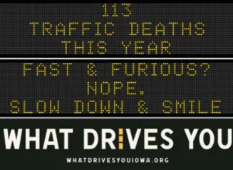 Traffic roadside graphic with text of the news article title.