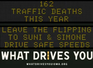 Traffic roadside graphic with text of the news article title.
