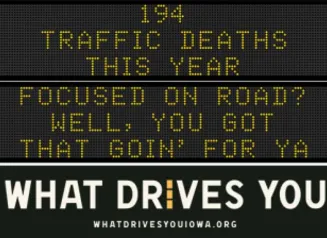 Traffic roadside graphic with text of the news article title.