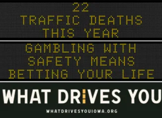 Traffic roadside graphic with text of the news article title.