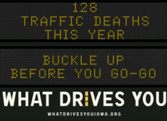 Traffic roadside graphic with text of the news article title.