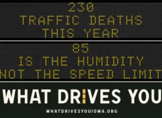 Traffic roadside graphic with text of the news article title.