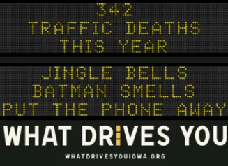 Traffic roadside graphic with text of the news article title.