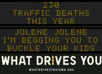 Traffic roadside graphic with text of the news article title.
