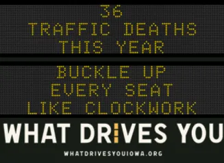 Traffic roadside graphic with text of the news article title.