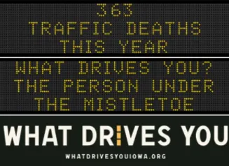 Traffic roadside graphic with text of the news article title.