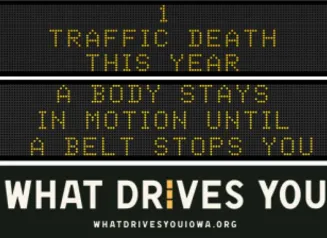 Traffic roadside graphic with text of the news article title.