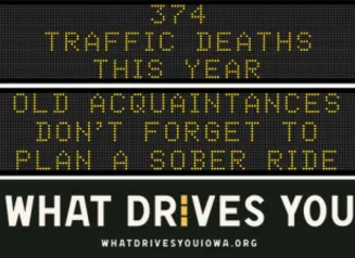 Traffic roadside graphic with text of the news article title.
